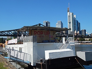 The POP UP BOAT docks on the banks of the Main