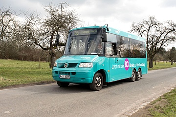 With bus and train out into the green